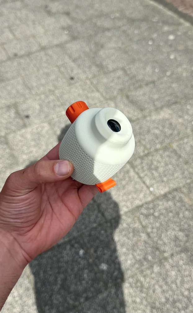 Hand holding a Murmur prototype